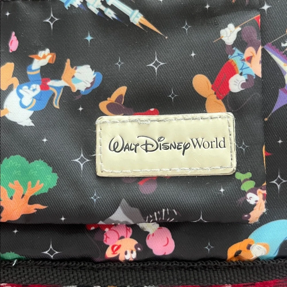 Disney Parks Stroller Organizer featuring an allover character print. GUC